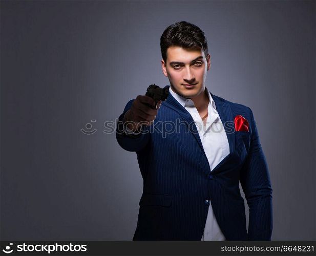 Handsome man against gray background