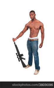 Handsome man holding an automatic assault rifle
