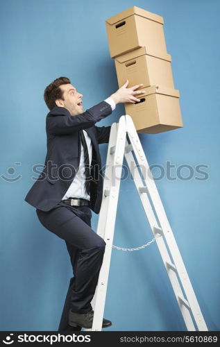 Handsome man holding the paper boxes