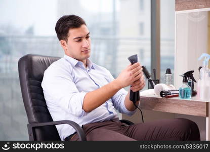 Handsome man in beauty salon