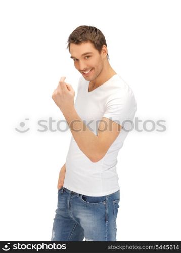 handsome man in white shirt making inviting gesture