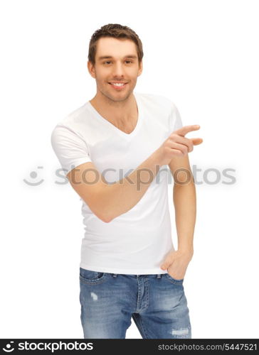handsome man in white shirt pointing his finger