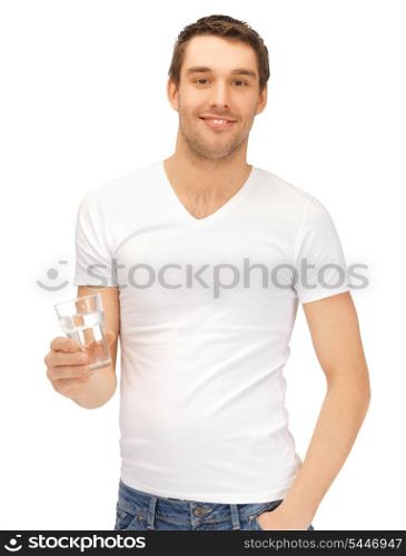 handsome man in white shirt with glass of water