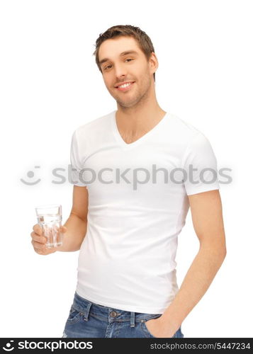 handsome man in white shirt with glass of water