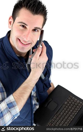 Handsome man listening to a voice message