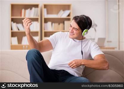 Handsome man listening to the music