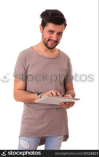 Handsome man relaxing with a tablet computer