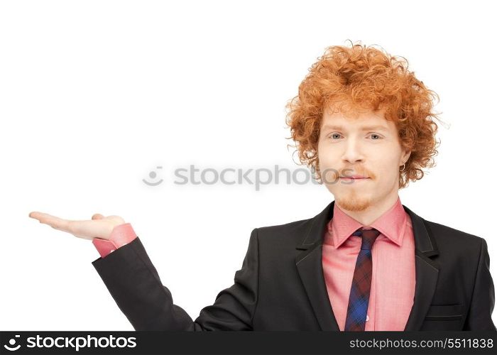 handsome man showing something on the palm of his hand