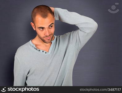 Handsome man standing on blue background