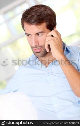 Handsome man talking on mobile phone