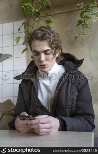 handsome man using smartphone