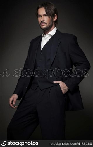 Handsome man wearing dark suit