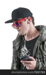 Handsome man with tangled headphones in a twisted mess