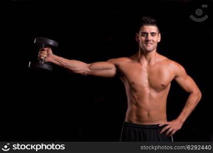 Handsome man working out isolated over a copy space background
