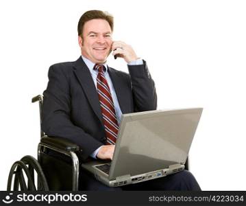 Handsome mature businessman in wheelchair with his laptop and cellphone. Isolated on white.
