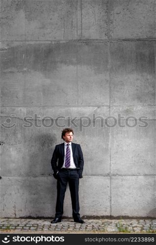 Handsome mature caucasian businessman outdoor wearing suit. Handsome mature businessman outdoor