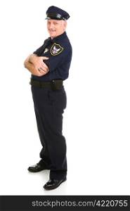 Handsome, mature police officer in a relaxed pose with arms crossed. He&rsquo;s leaning back on invisible white space. Insert your sign.