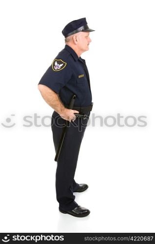 Handsome mature police officer in profile. Full body isolated on white.