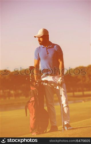 handsome middle eastern golf player portrait at course at sunny day. golfer portrait at golf course