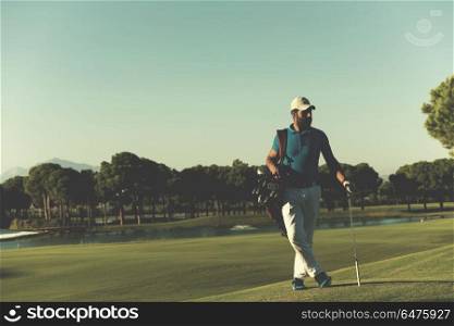 handsome middle eastern golf player portrait at course at sunny day. golfer portrait at golf course