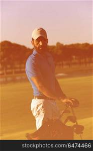 handsome middle eastern golfer portrait at golf course at sunny day. golfer portrait at golf course