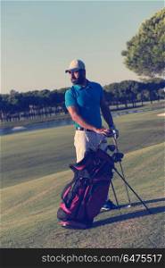 handsome middle eastern golfer portrait at golf course at sunny day. golfer portrait at golf course
