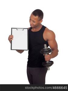 Handsome muscled man training with dumbbells and clipboard in blank isolated on a white background&#xA;