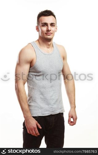 Handsome muscular sporty fit man isolated.. Handsome muscled sporty fit man. Portrait of young muscular guy isolated on white. Healthy lifestyle.