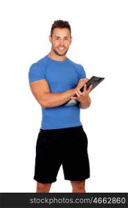 Handsome personal trainer with a clipboard isolated on a white background