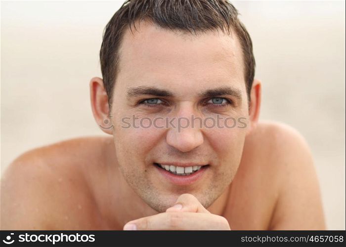 Handsome russian man at the beach