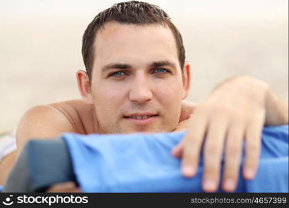 Handsome russian man at the beach