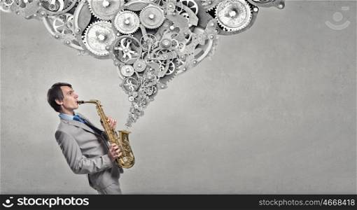 Handsome saxophonist. Young man playing saxophone and gears coming out