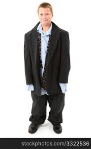 Handsome ten year old american boy in over sized suit over white.