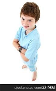 Handsome ten year old american boy standing over white background. Top view.