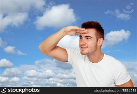 Handsome youn men looking on a beautiful sky of background