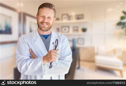 Handsome Young Adult Male Doctor With Beard Inside Office.