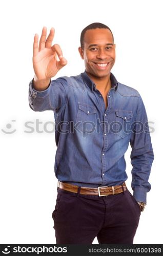 Handsome young african business man signaling ok, isolated over white