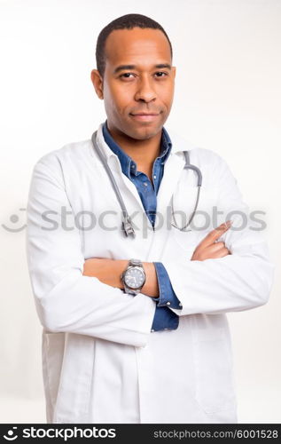 Handsome young african doctor posing isolated over a white background