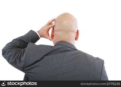 Handsome young business man in modern elegant suit standing back, isolated over white background. Concept of idea, ask question, think up, choose, decide,