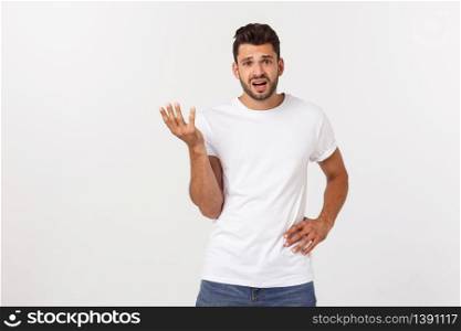 Handsome young business man standing praying, isolated over white background. Concept of idea, ask question, think up, choose, decide,. Handsome young business man standing praying, isolated over white background. Concept of idea, ask question, think up, choose, decide