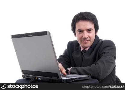 Handsome young business man working with laptop