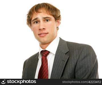 Handsome young businessman confused or worried. Isolated on white.