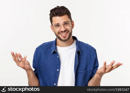 Handsome young businessman in classic suit smiling, looking at camera keeping palm up on white background. Business man with empty hand. Handsome young businessman in classic suit smiling, looking at camera keeping palm up on white background. Business man with empty hand.