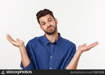 Handsome young businessman in classic suit smiling, looking at camera keeping palm up on white background. Business man with empty hand. Handsome young businessman in classic suit smiling, looking at camera keeping palm up on white background. Business man with empty hand.