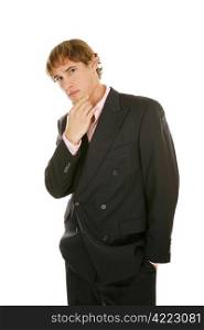 Handsome young businessman lost in thought. Isolated on white.