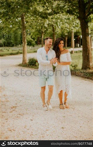 Handsome young couple walking in the park