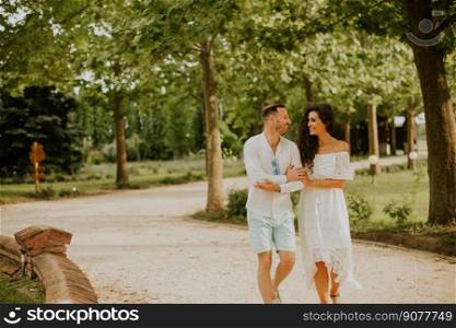 Handsome young couple walking in the park