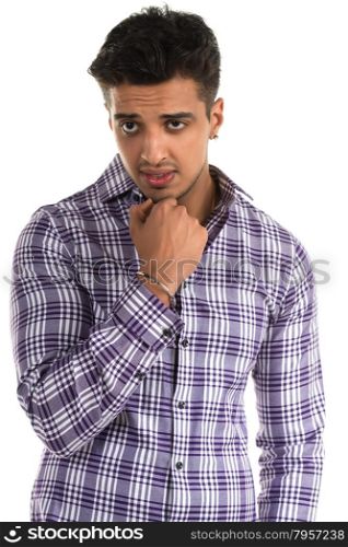 Handsome young Indian man with a confused expression
