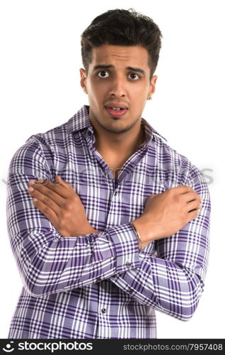 Handsome young Indian man with a frightened expression