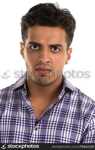 Handsome young Indian man with an aggressive expression